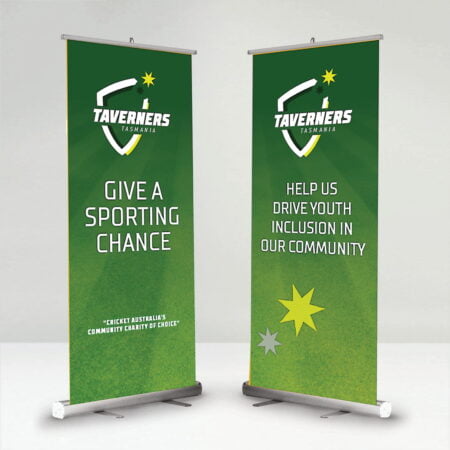 Two boldly coloured green pull up banners, one with the Taverners call to action, Give a sporting chance, the other with the words, Help us drive youth inclusion in our community.