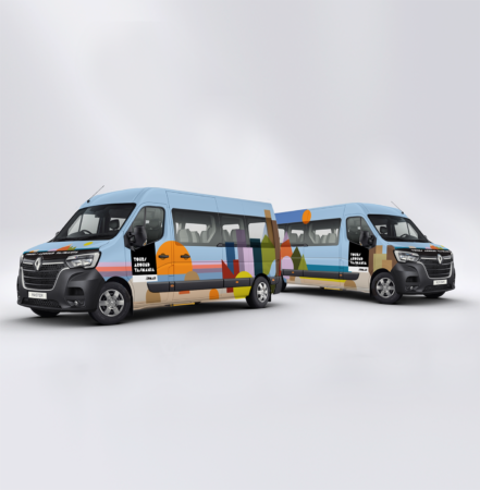 Picture of two Tours Around Tasmania tour buses in the bright coloured livery that reflects the Tasmanian landscape